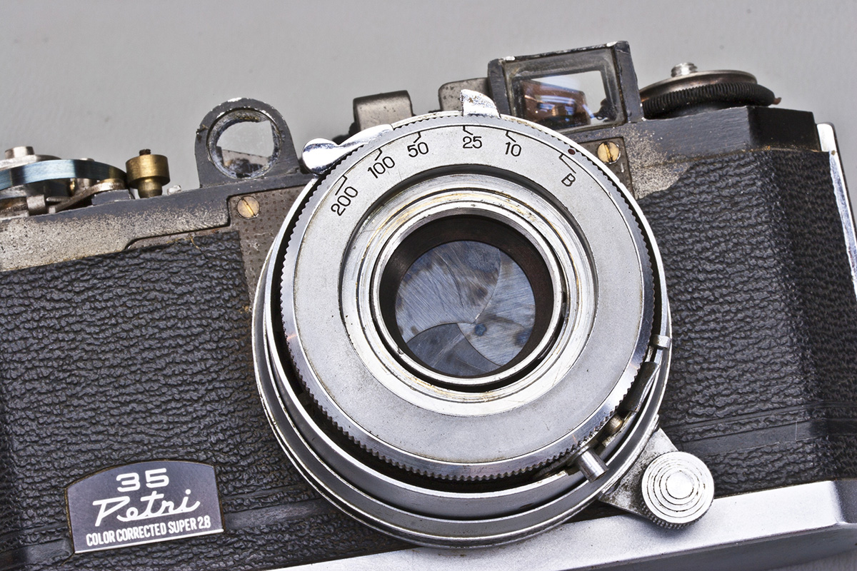 Remove the shutter-speed dial.