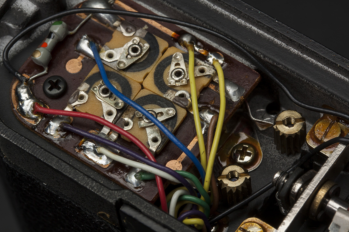 The swipe contacts have come loose on this AT dial. Use the previous button to help guide you through reassembly procedure.